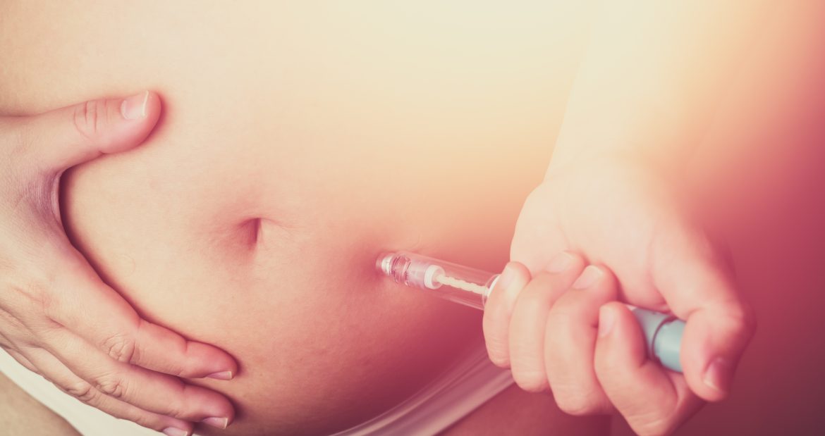 is ivf painful? a woman injecting herself with medication